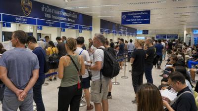 foreigners seeking visa service at Thai immigration office