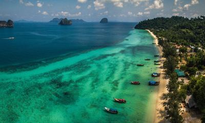 Koh Ngai Beach Boat distant view
